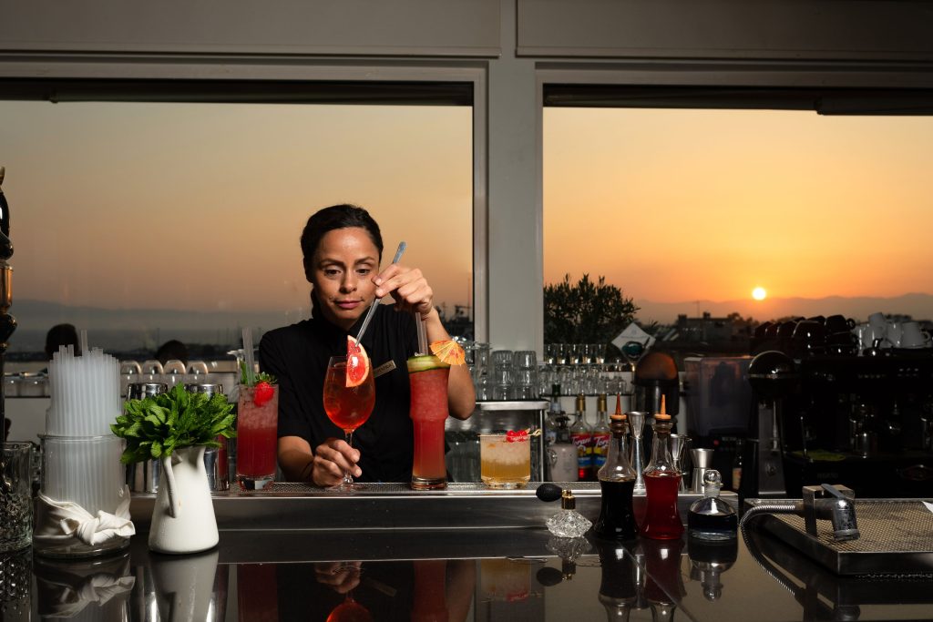 Enjoy a drink at our bar, where expert bartenders craft cocktails amidst stunning views of the surrounding landscape.